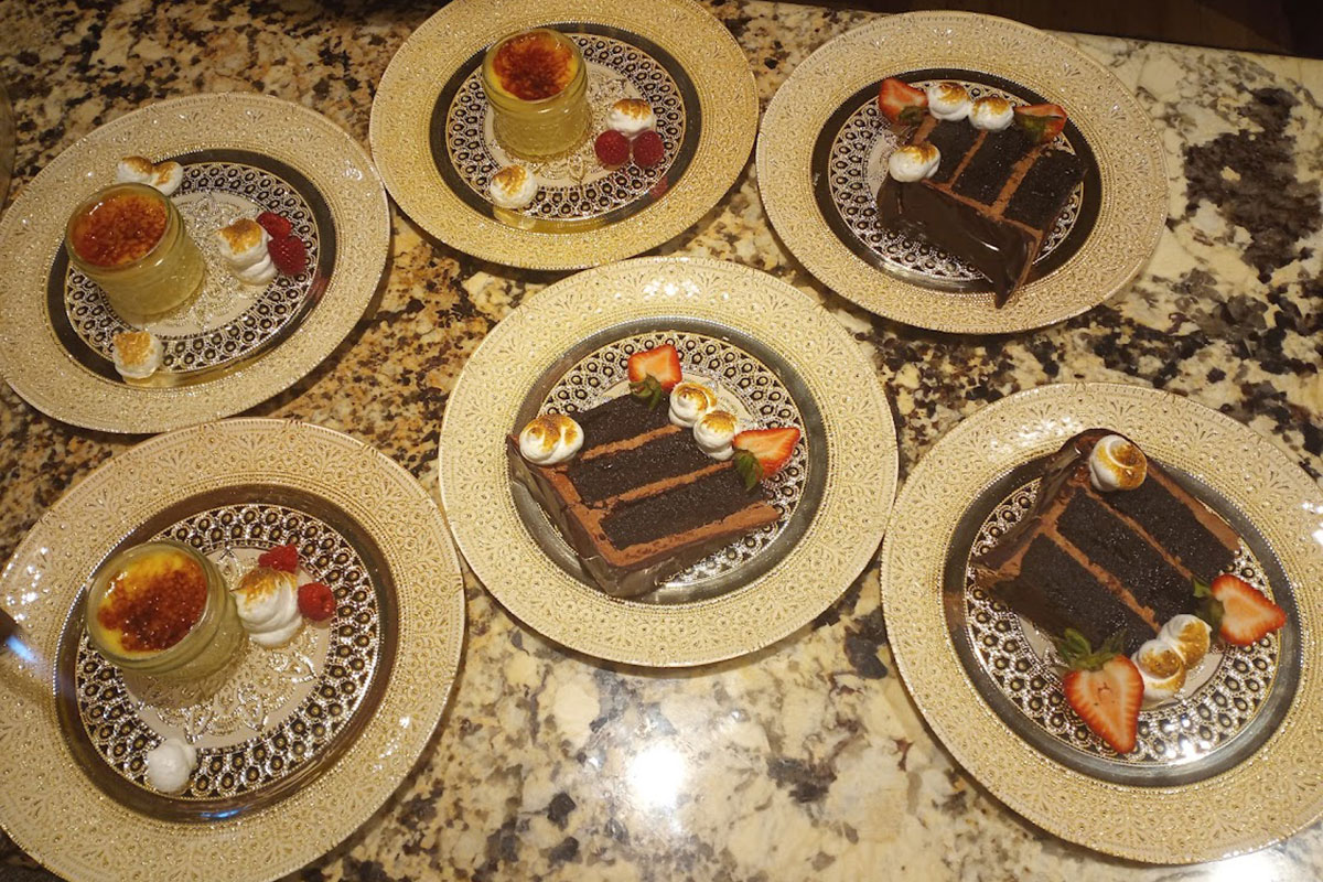 Six elegant dessert plates arranged beautifully.