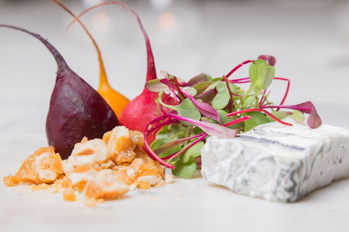Colorful vegetables with cheese and nuts